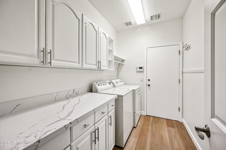 865 South Oak Street Gilbert, AZ 85233 - Photo 20 of 27 a view of a storage and utility room with a sink