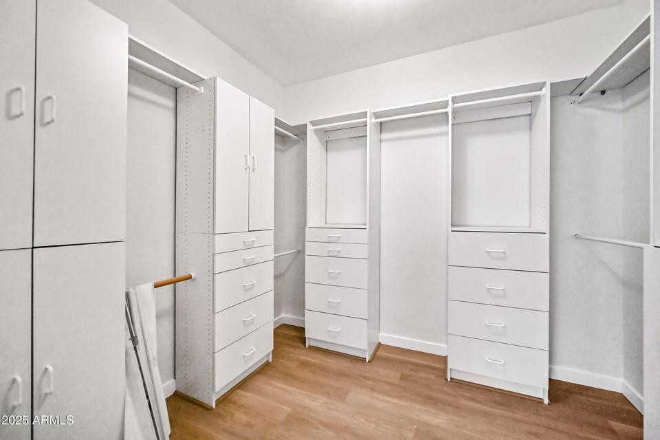 865 South Oak Street Gilbert, AZ 85233 - Photo 21 of 27 a view of walk in closet with empty racks