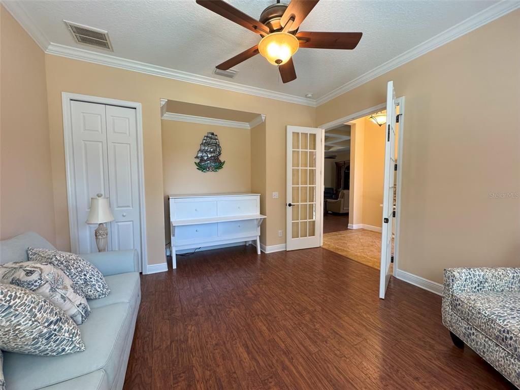 1024 West Beagle Run Loop Hernando, FL 34442 - Photo 6 of 44 a view of bedroom with furniture and wooden floor
