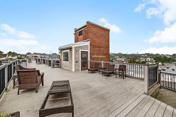a view of street with parked cars