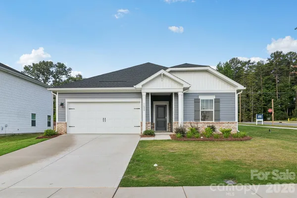 a front view of house with yard