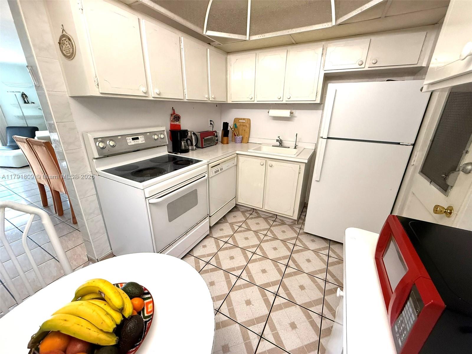 1355 Northeast 167th Street, Unit 302 Miami, FL 33162 - Photo 4 of 18