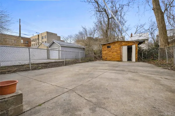 a view of a house with a snow in the yard