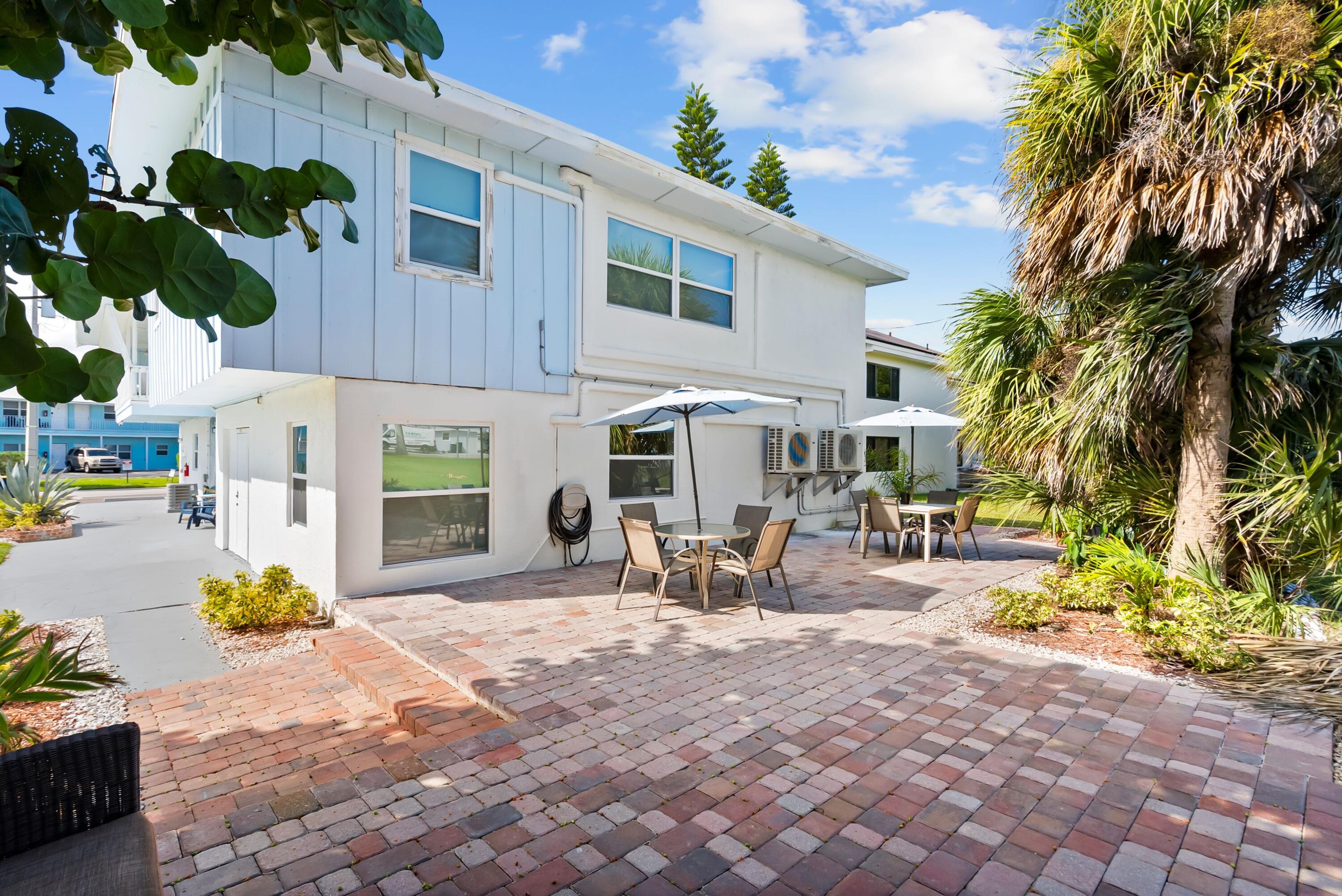 670 Hernando Street, Unit A Fort Pierce, FL 34949 - Photo 18 of 21 a view of a backyard with sitting area