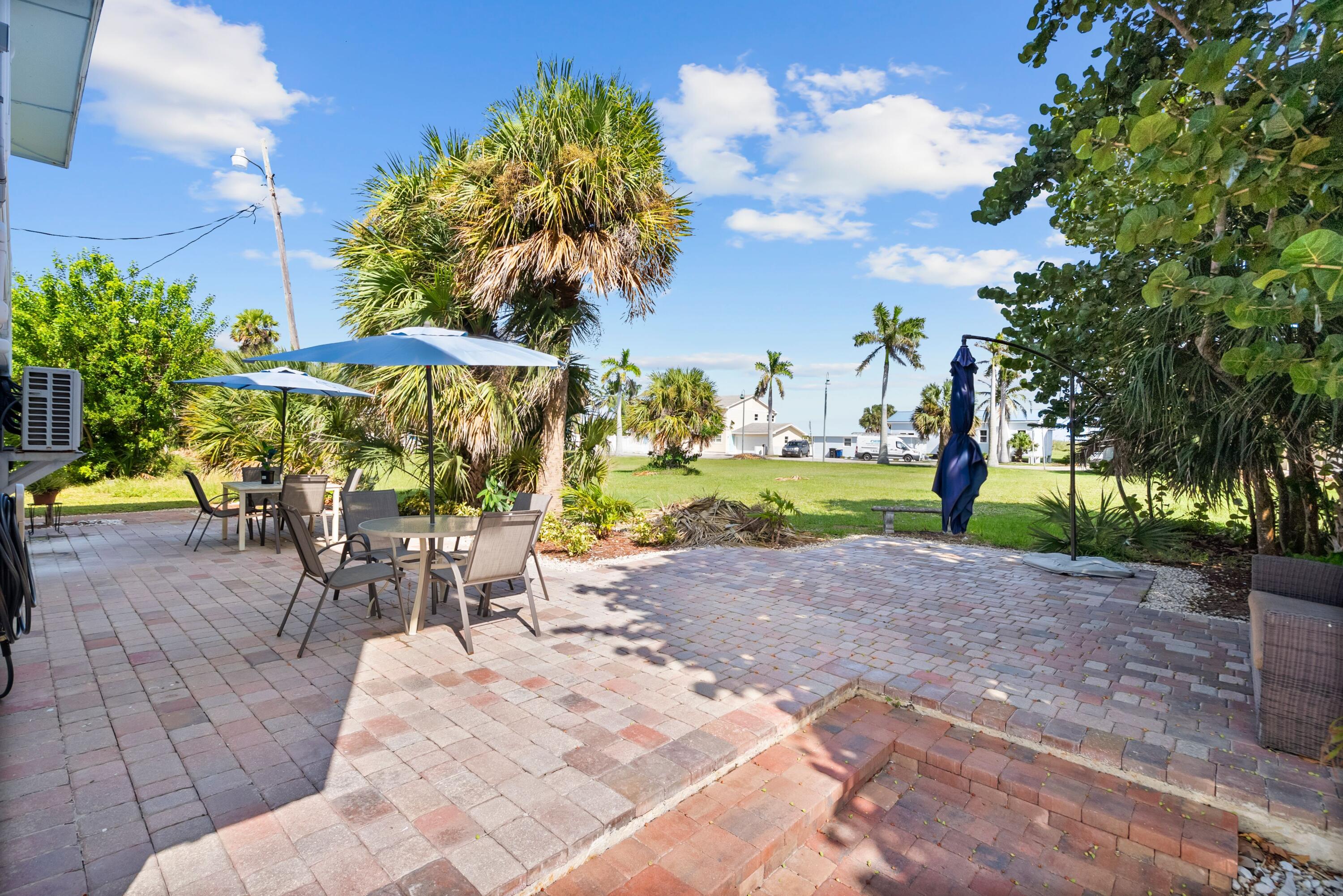 670 Hernando Street, Unit A Fort Pierce, FL 34949 - Photo 19 of 21 a view of a backyard with sitting area