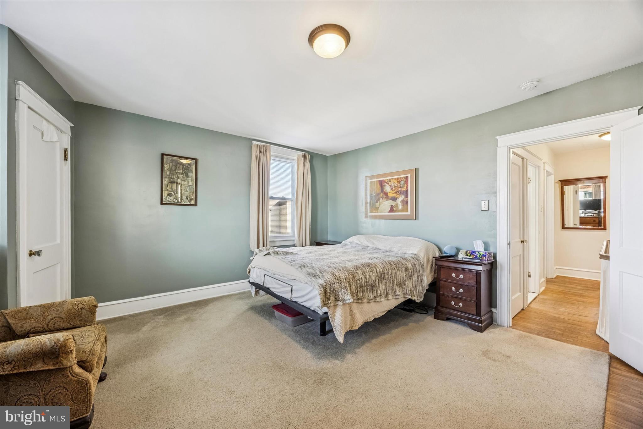 4032 Dayton Road Drexel Hill, PA 19026 - Photo 13 of 22 a spacious bedroom with a bed and dresser