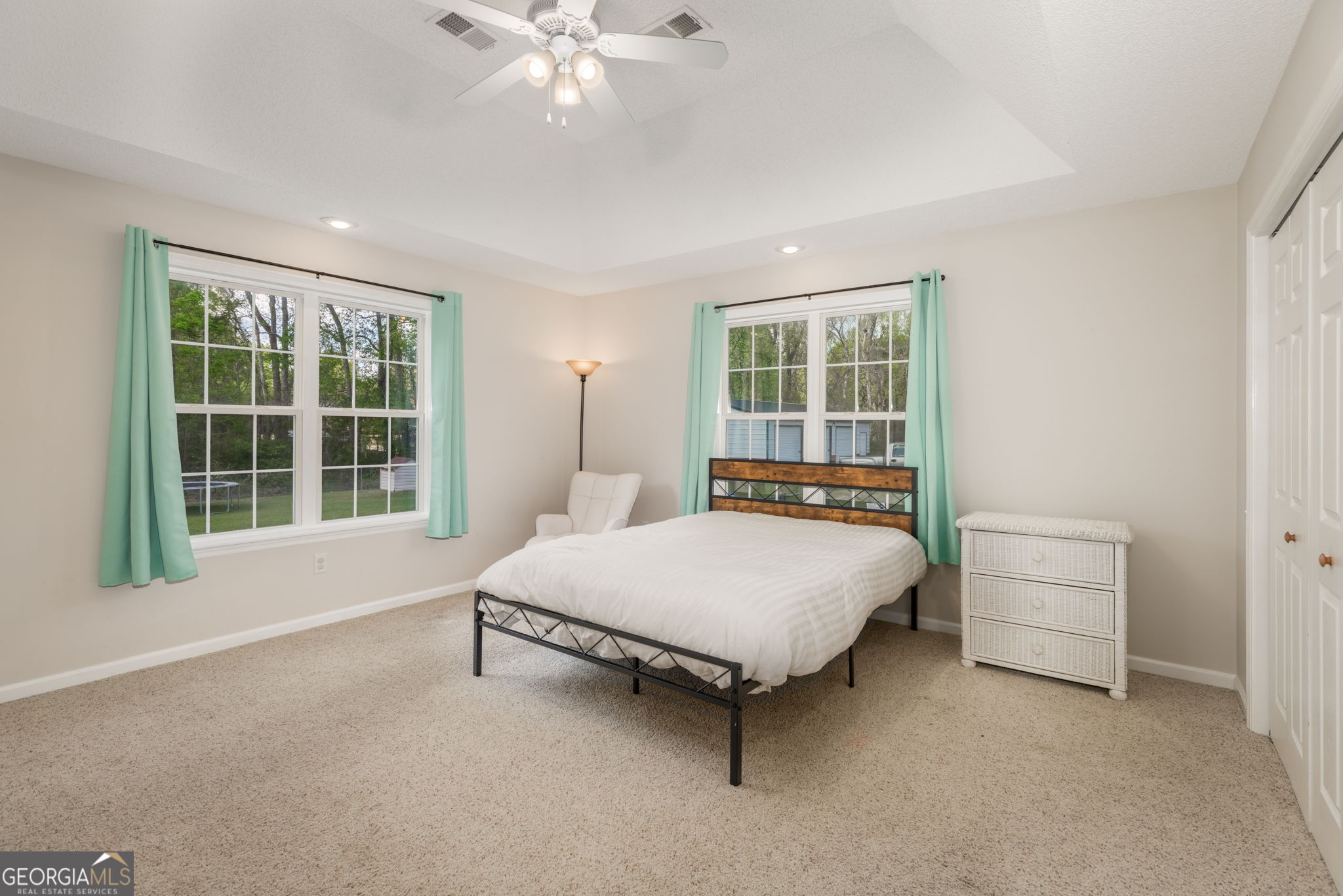 543 Pointe W Drive Dublin, GA 31021 - Photo 16 of 37 a spacious bedroom with a bed and window