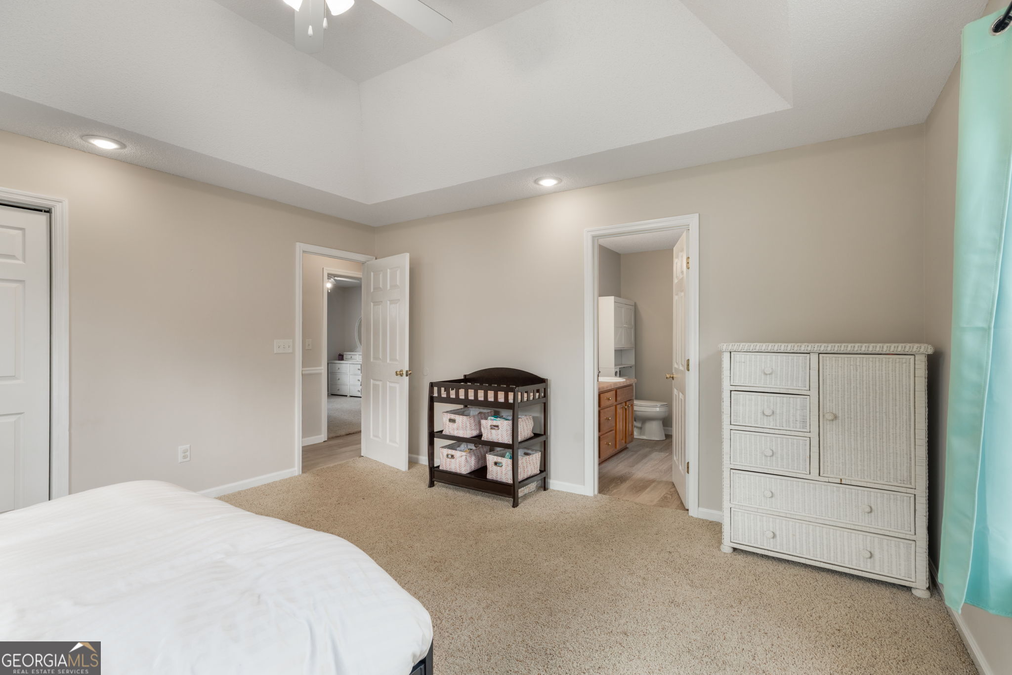 543 Pointe W Drive Dublin, GA 31021 - Photo 18 of 37 a bedroom with a bed and a cabinets