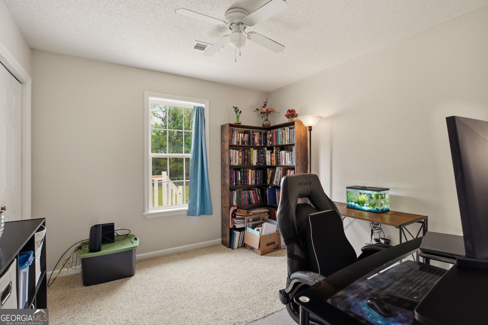 543 Pointe W Drive Dublin, GA 31021 - Photo 27 of 37 a view of a workspace with furniture and a window