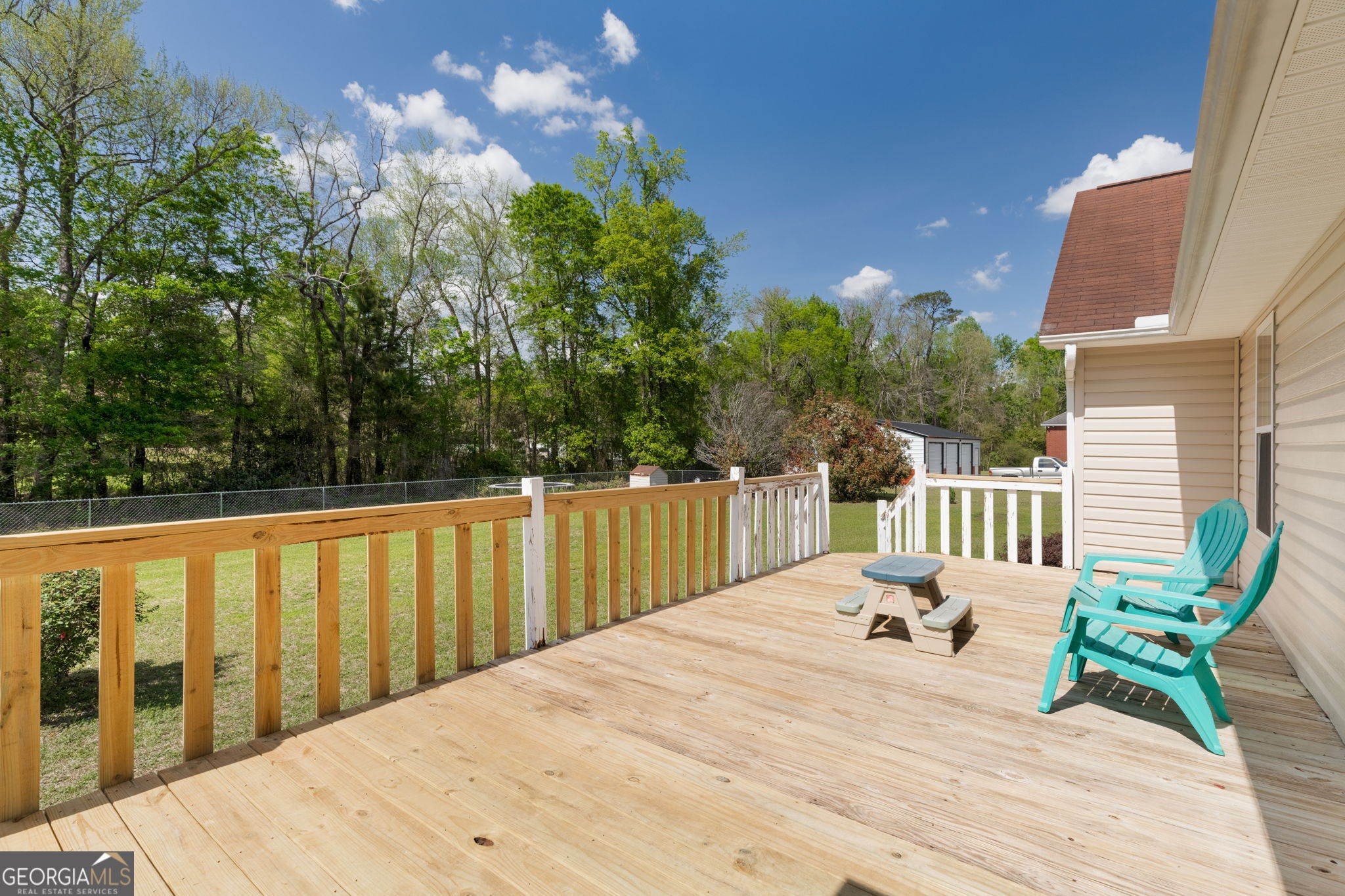 543 Pointe W Drive Dublin, GA 31021 - Photo 32 of 37 a view of balcony with wooden floor and fence