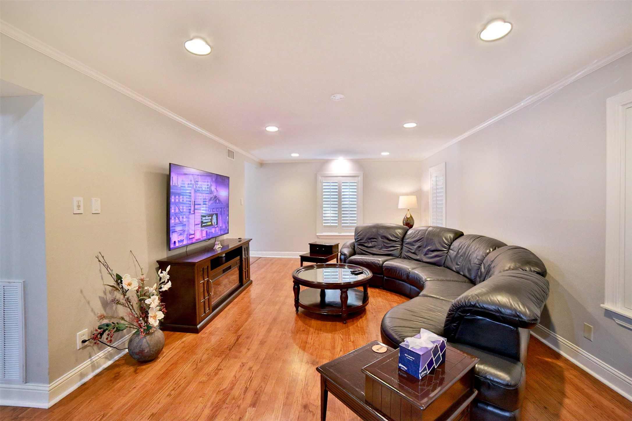 2625 Peckham Street Houston, TX 77098 - Photo 5 of 27 a living room with furniture and a flat screen tv