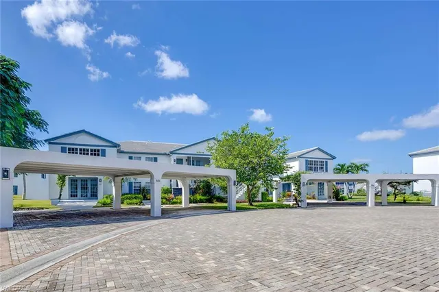 a view of a building with a yard