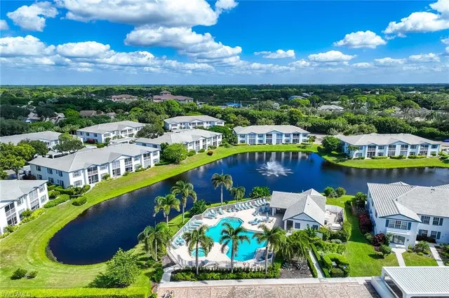 a view of a swimming pool with a garden
