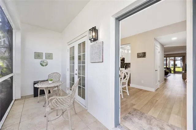 a view of a livingroom with furniture and front door