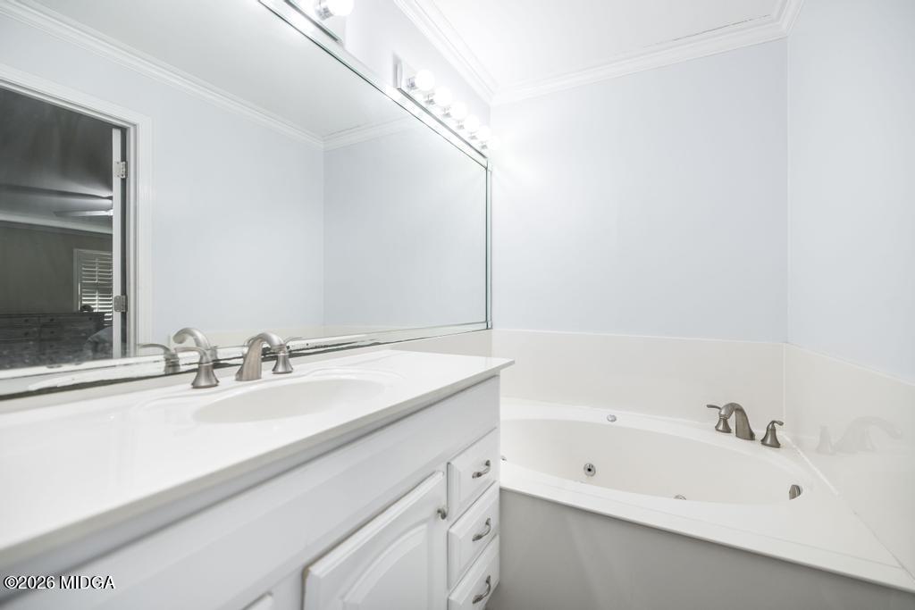 4759 Oxford Road Macon, GA 31210 - Photo 24 of 42 a bathroom with a sink and a bathtub