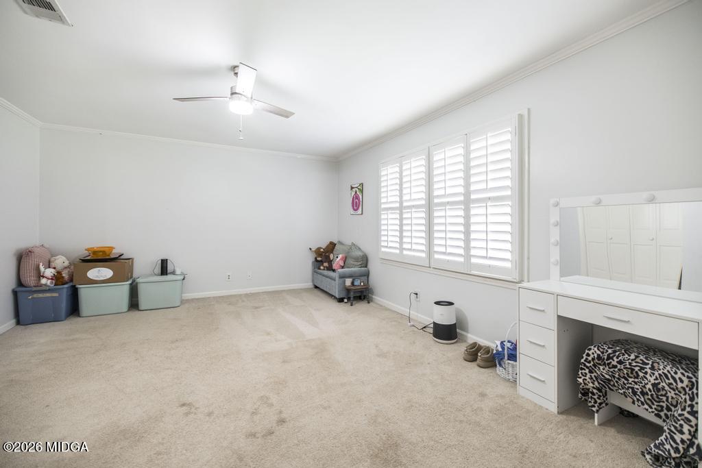 4759 Oxford Road Macon, GA 31210 - Photo 31 of 42 a view of livingroom with furniture and windows