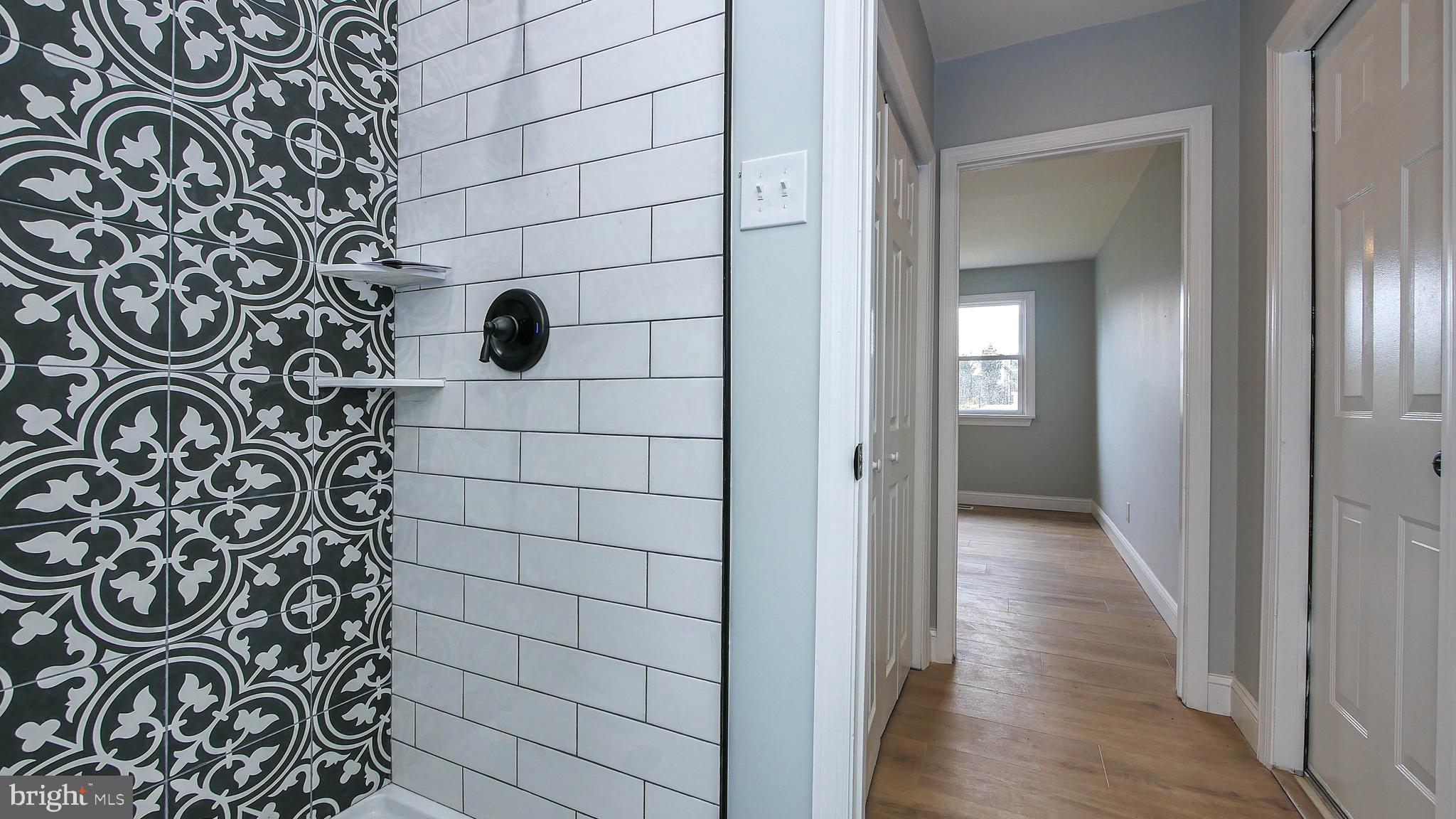 4623 Schooner Road, Unit A Brigantine, NJ 08203 - Photo 20 of 30 a bathroom with a shower
