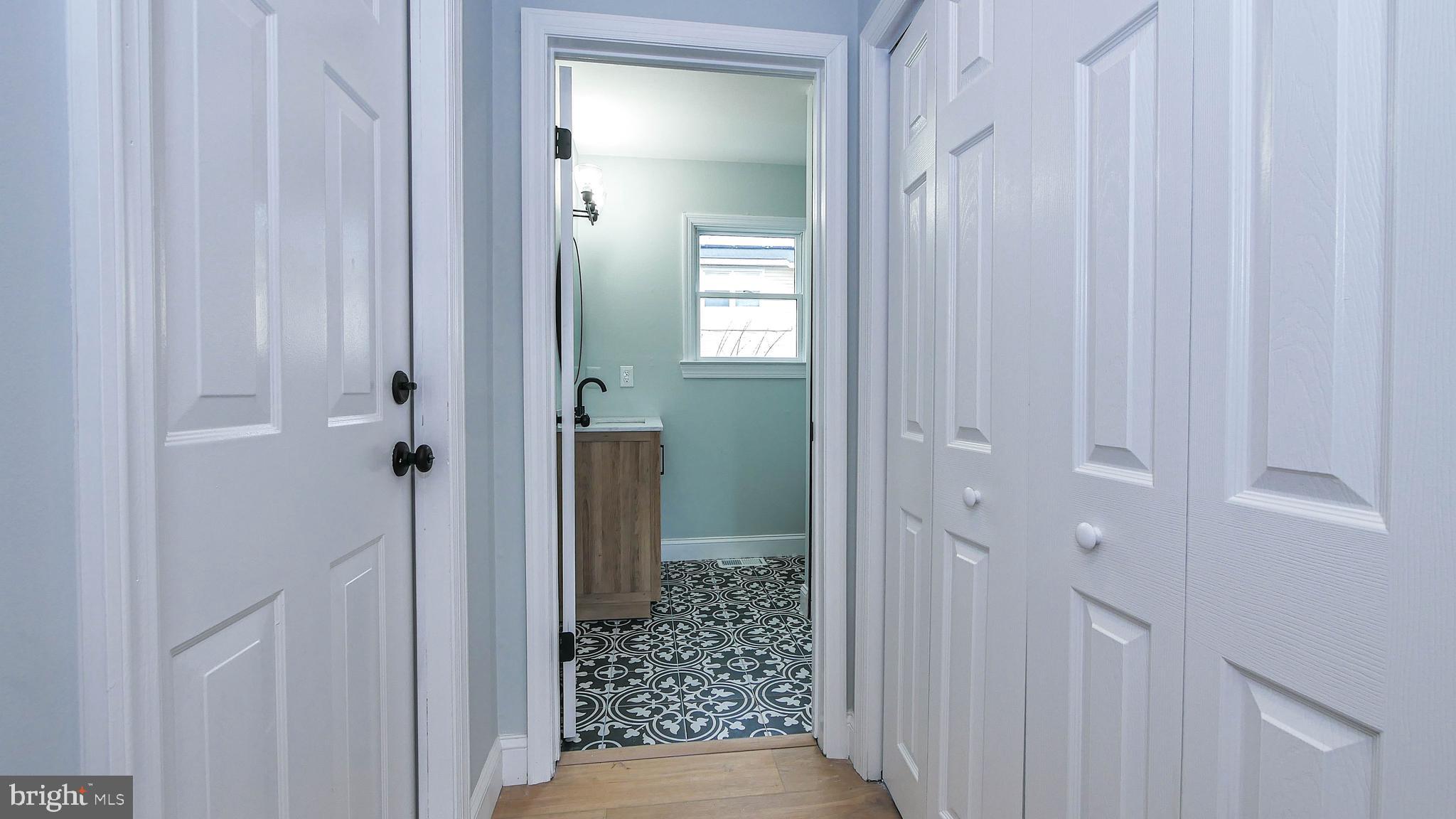 4623 Schooner Road, Unit A Brigantine, NJ 08203 - Photo 23 of 30 a view of a bathroom from a hallway