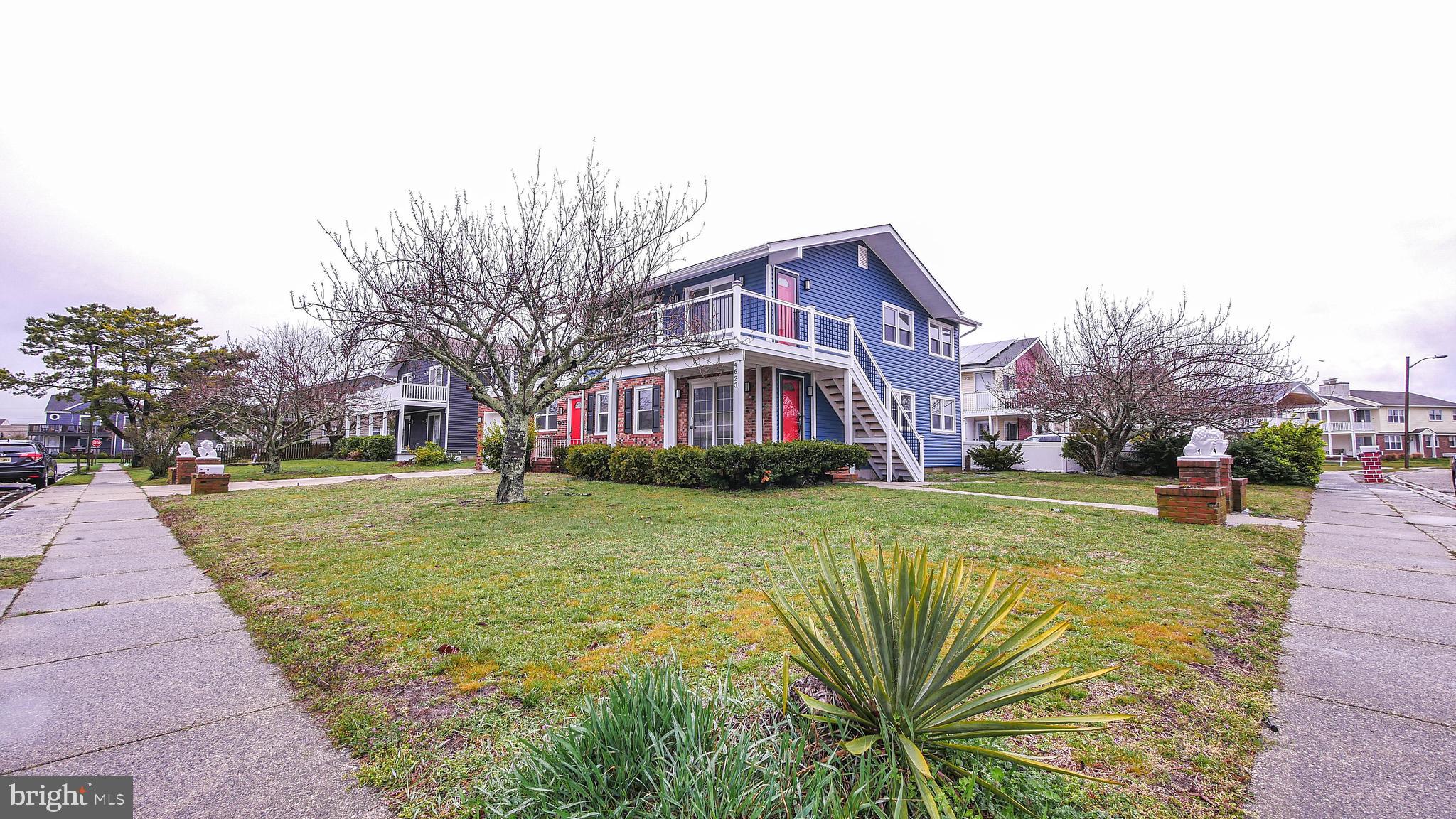 4623 Schooner Road, Unit A Brigantine, NJ 08203 - Photo 3 of 30 a front view of a house with garden
