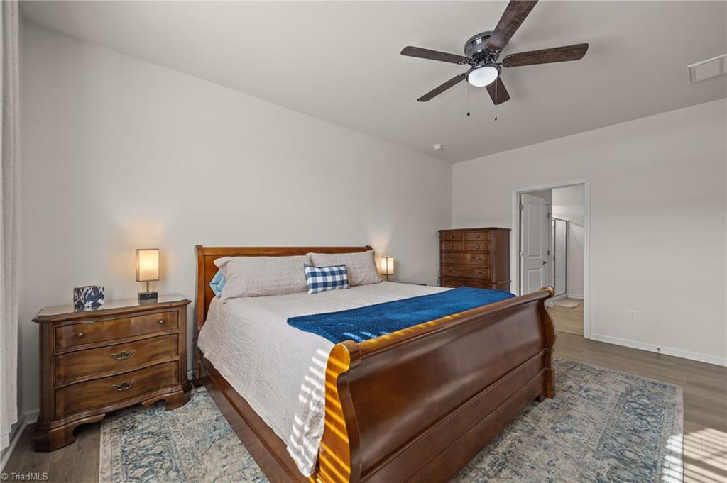 6524 Grogan Hill Road Whitsett, NC 27377 - Photo 15 of 39 Primary Bedroom