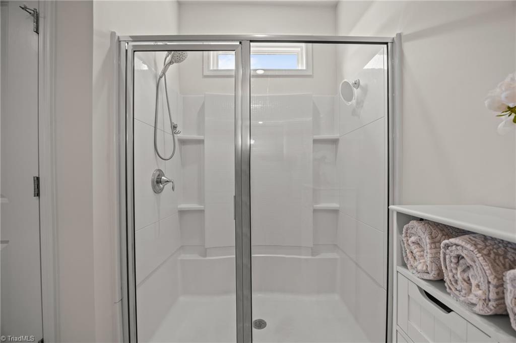 6524 Grogan Hill Road Whitsett, NC 27377 - Photo 18 of 39 Primary Bathroom