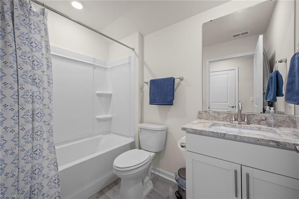 6524 Grogan Hill Road Whitsett, NC 27377 - Photo 30 of 39 Upstairs Bathroom