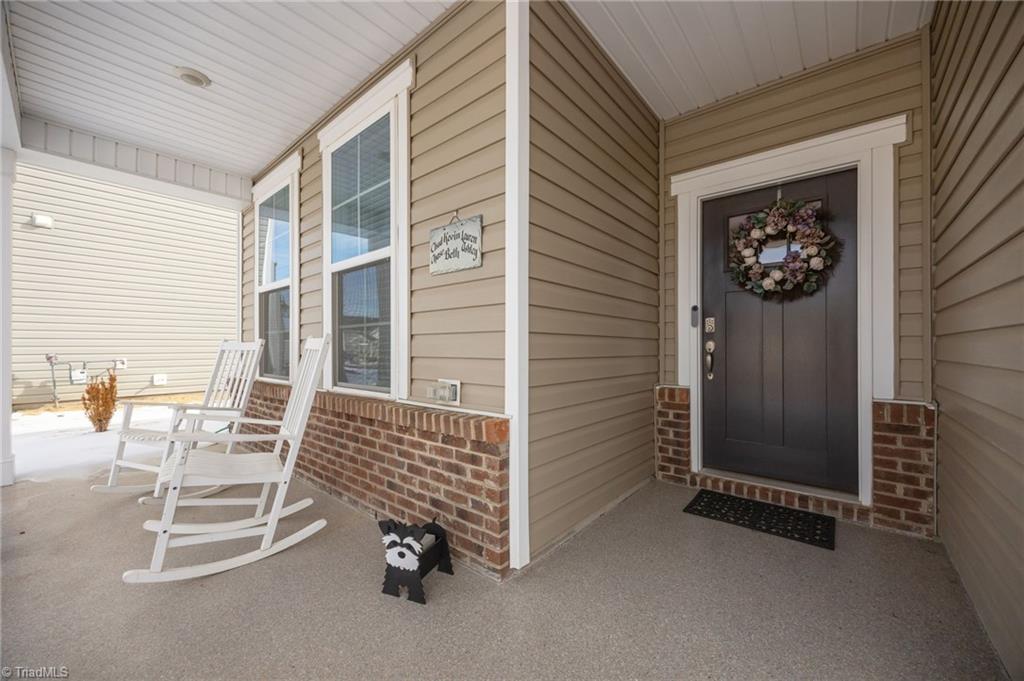 6524 Grogan Hill Road Whitsett, NC 27377 - Photo 3 of 39 Covered Front Porch