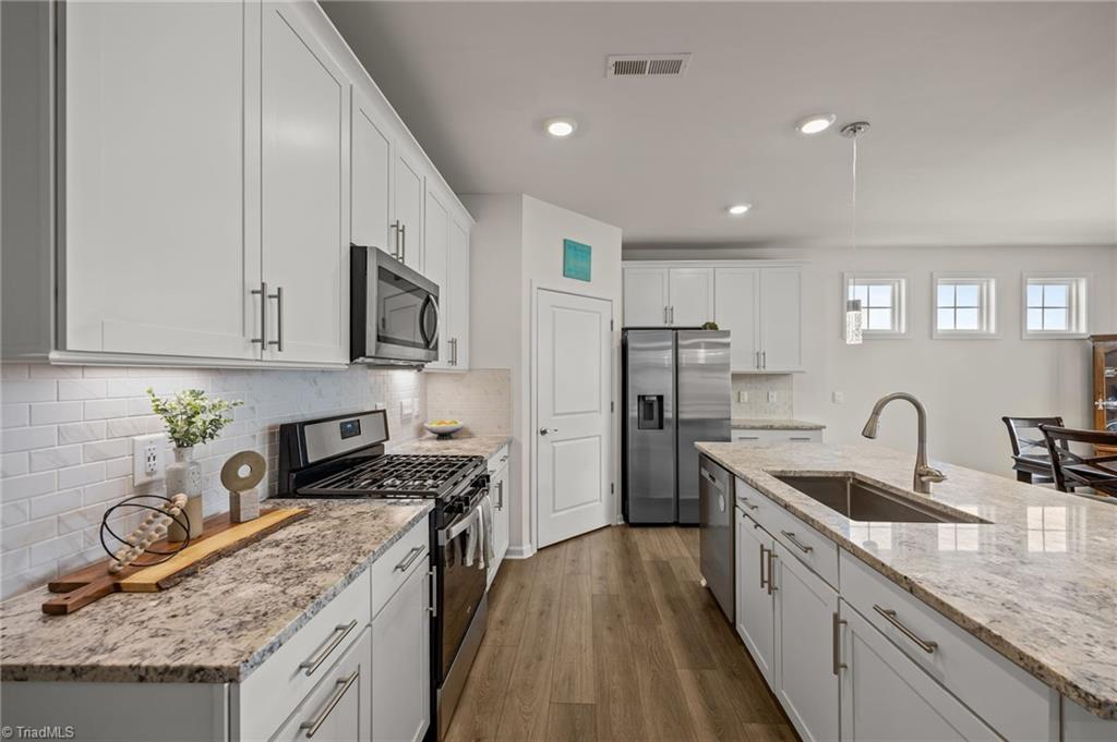 6524 Grogan Hill Road Whitsett, NC 27377 - Photo 7 of 39 Kitchen