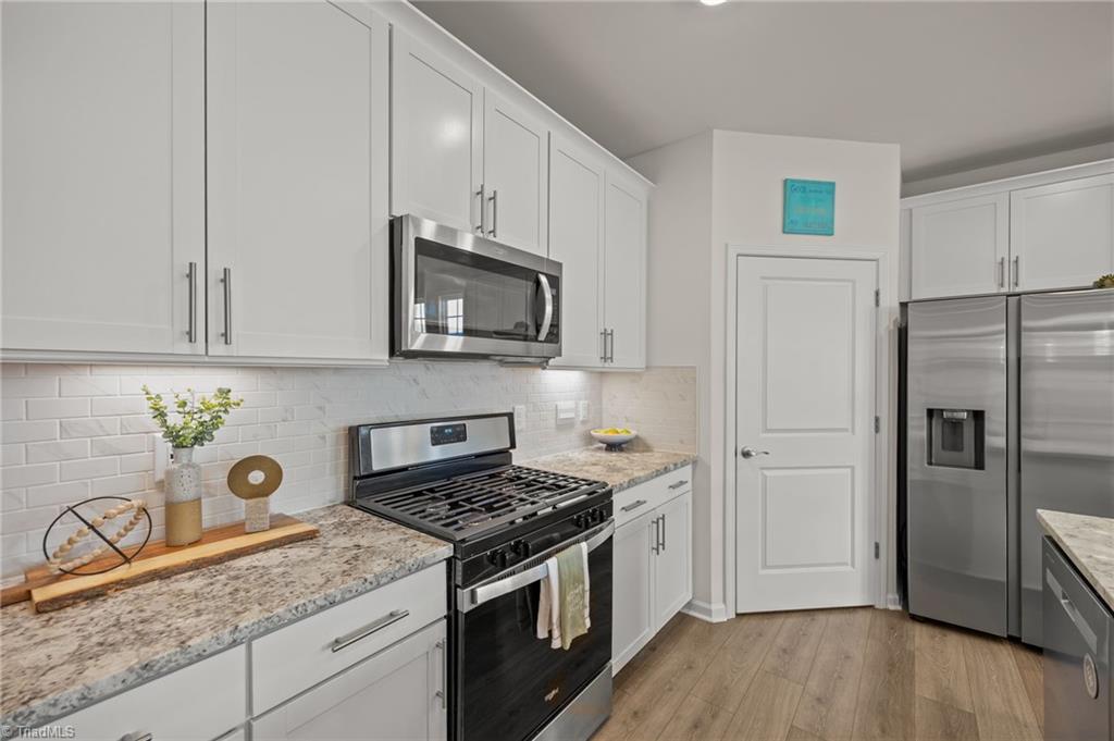 6524 Grogan Hill Road Whitsett, NC 27377 - Photo 8 of 39 Kitchen