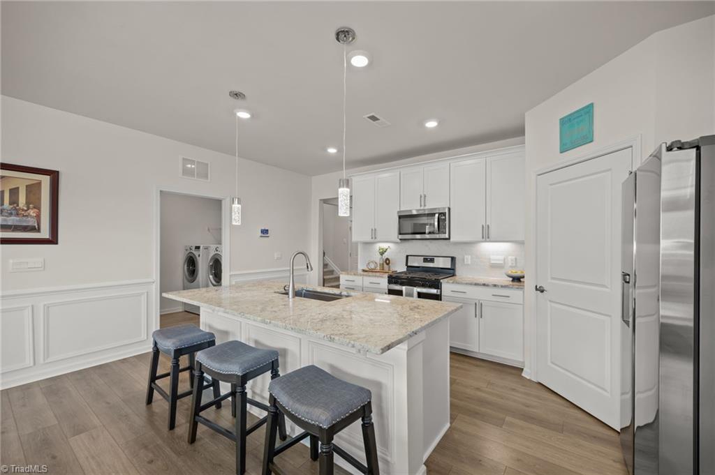 6524 Grogan Hill Road Whitsett, NC 27377 - Photo 9 of 39 Kitchen