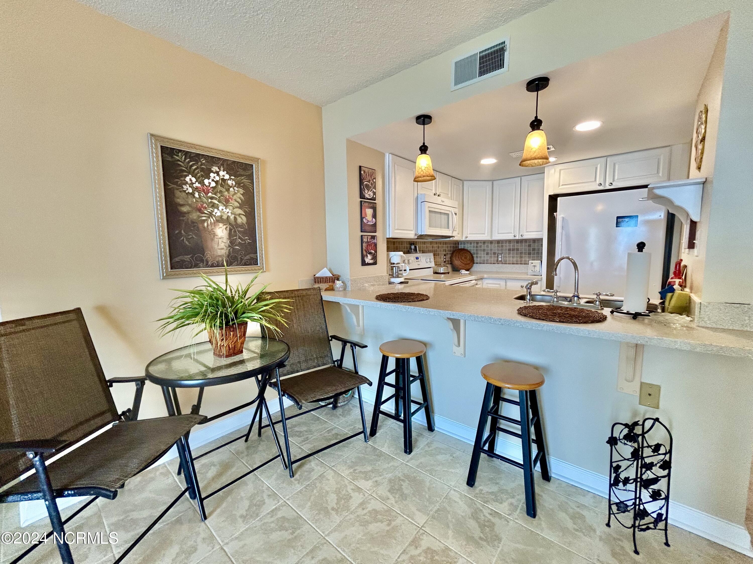 2000 New River Inlet Road, Unit 1403 North Topsail Beach, NC 28460 - Photo 7 of 22 IMG_1021