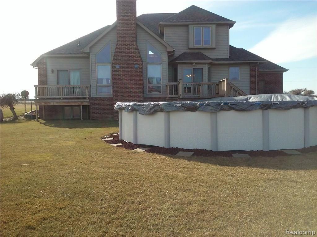 4660 Capac Road Capac, MI 48014 - Photo 49 of 65 This is a view of the back of the home.