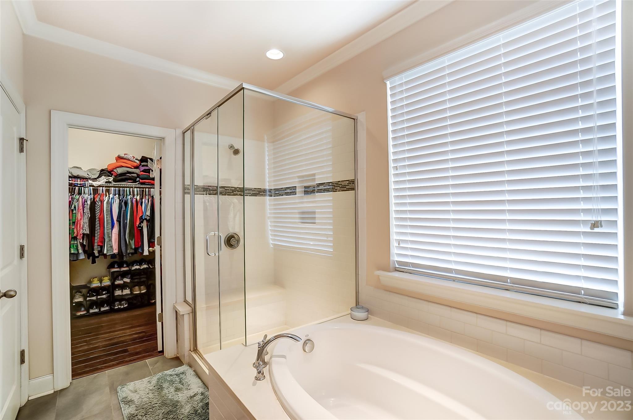 116 Helton Lane Fort Mill, SC 29708 - Photo 22 of 41 a bathroom with a bathtub and a shower