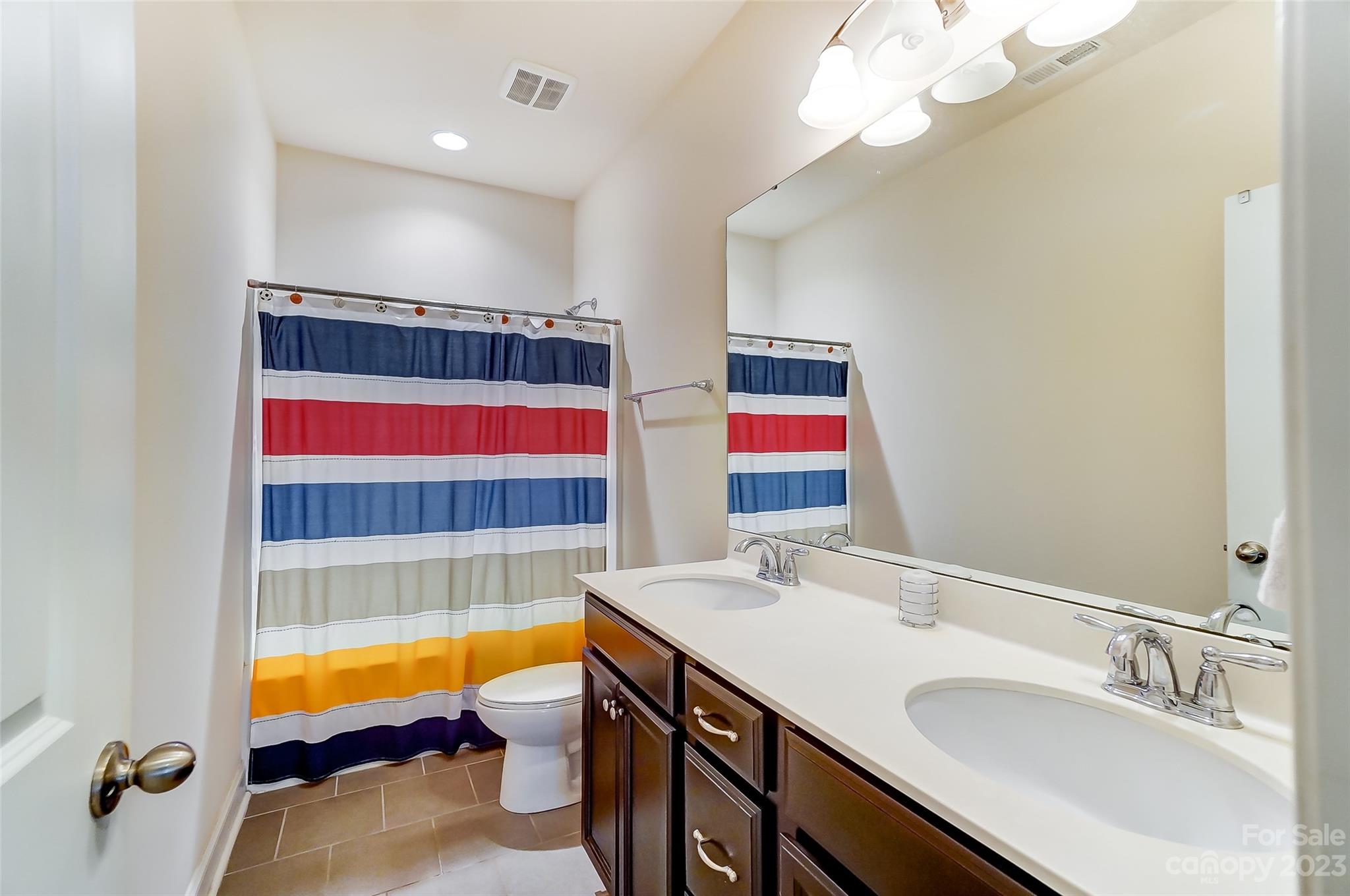 116 Helton Lane Fort Mill, SC 29708 - Photo 27 of 41 a bathroom with double vanity sink a mirror and bathtub