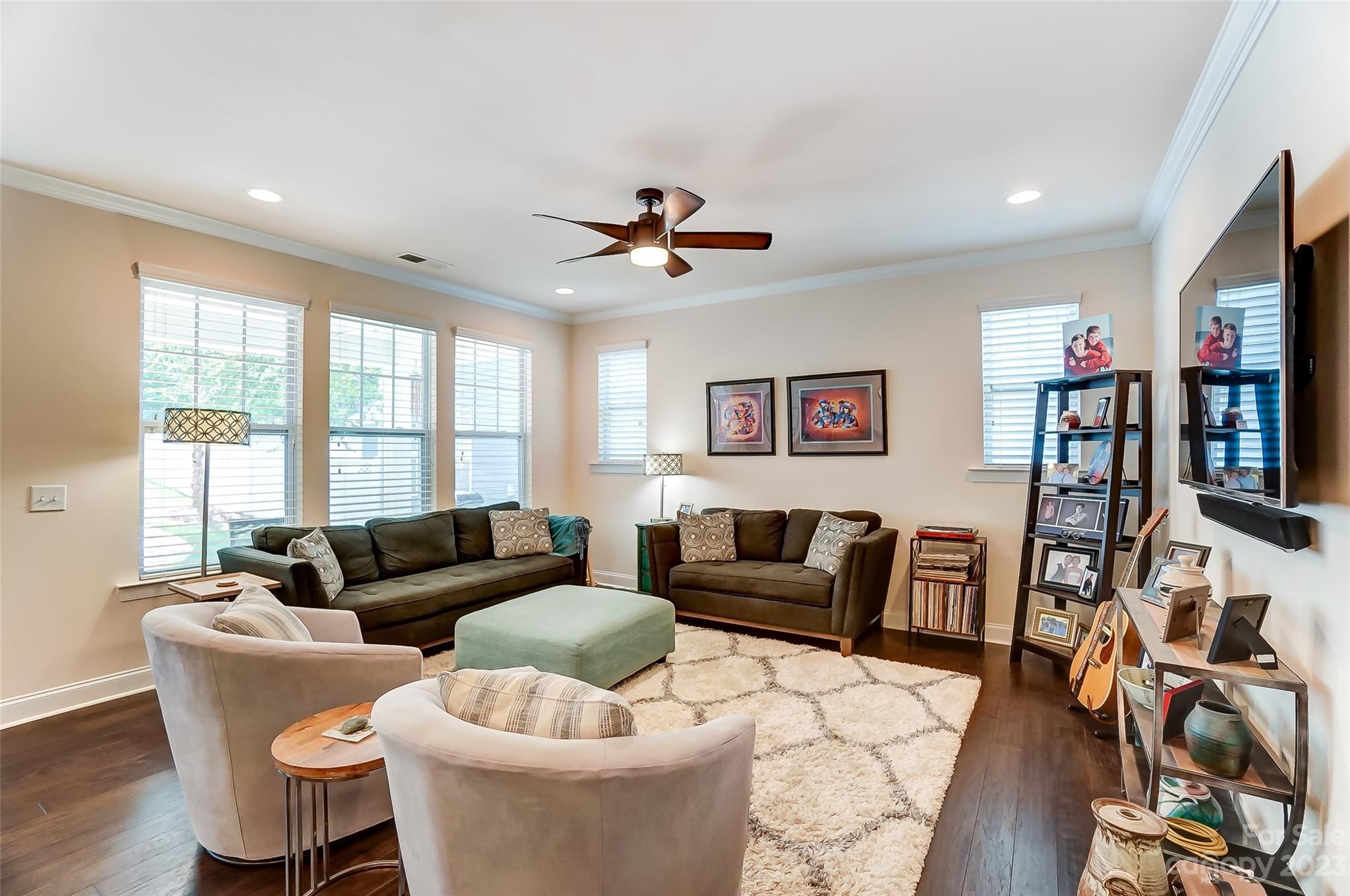 116 Helton Lane Fort Mill, SC 29708 - Photo 6 of 41 a living room with furniture a flat screen tv and a large window