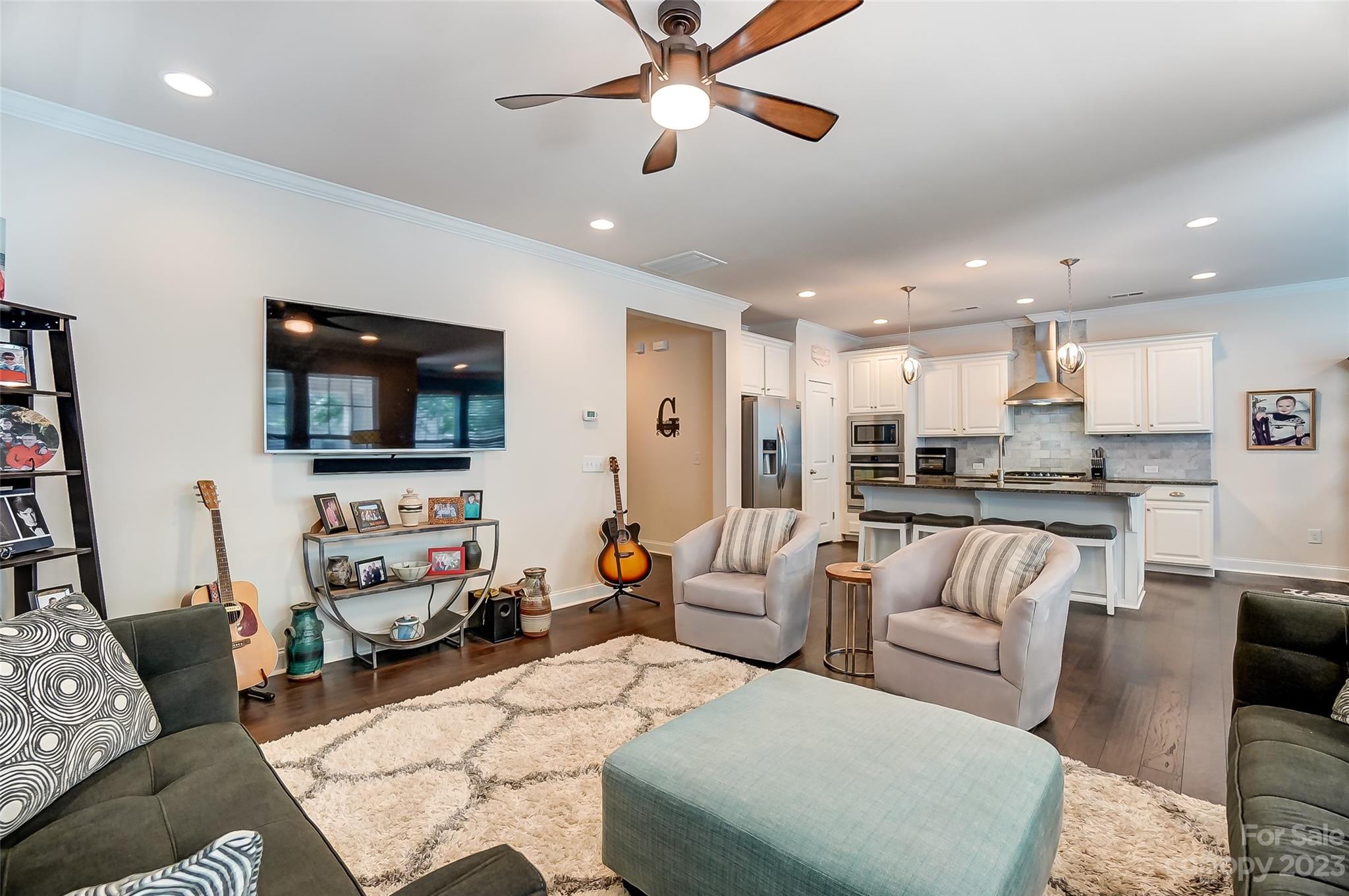 116 Helton Lane Fort Mill, SC 29708 - Photo 9 of 41 a living room with furniture and a flat screen tv