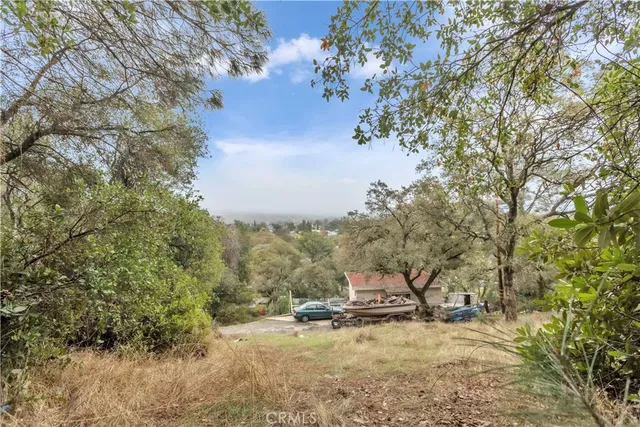 a view of mountain view with trees