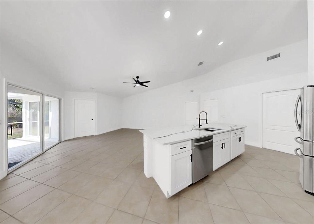 6409 Stone River Road Bradenton, FL 34203 - Photo 16 of 72 a view of a kitchen with electric appliances