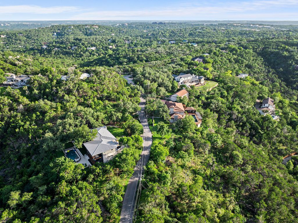 1104 Kennan Road West Lake Hills, TX 78746 - Photo 15 of 20 an aerial view of a house with a yard