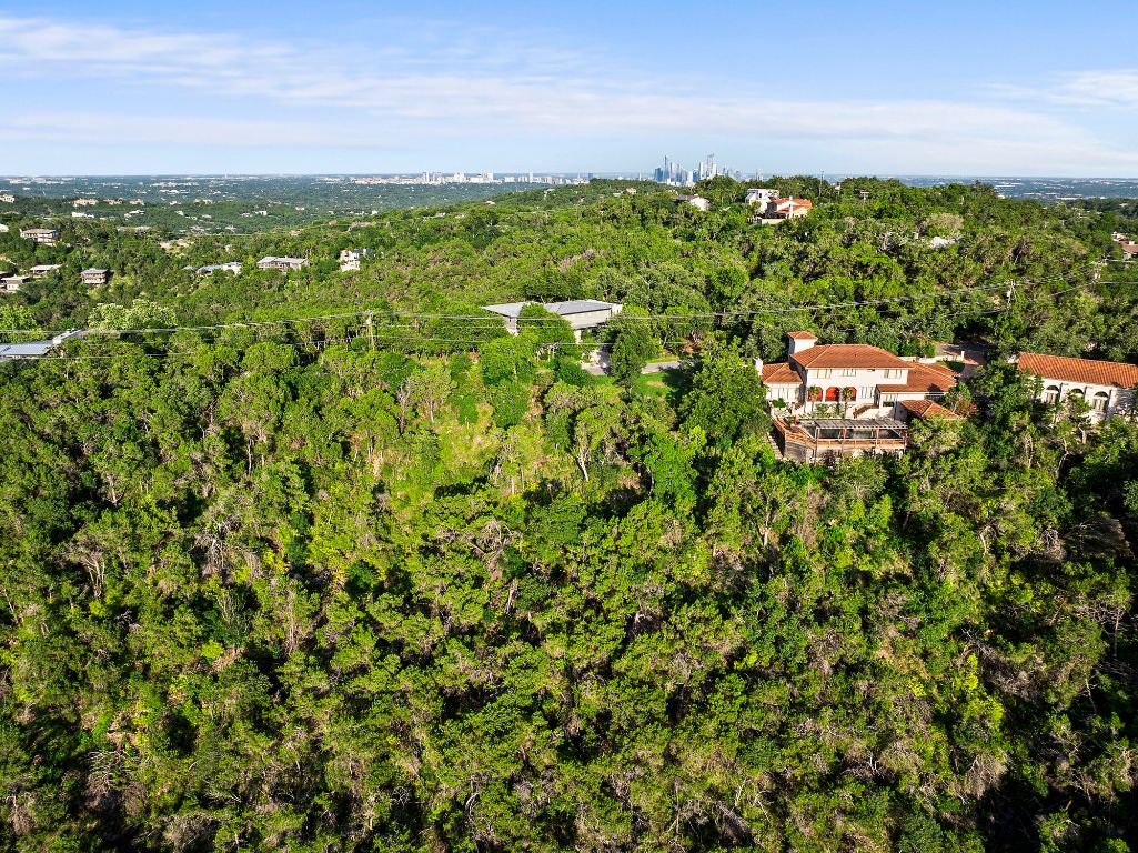 1104 Kennan Road West Lake Hills, TX 78746 - Photo 16 of 20 a view of a big yard with lots of green space