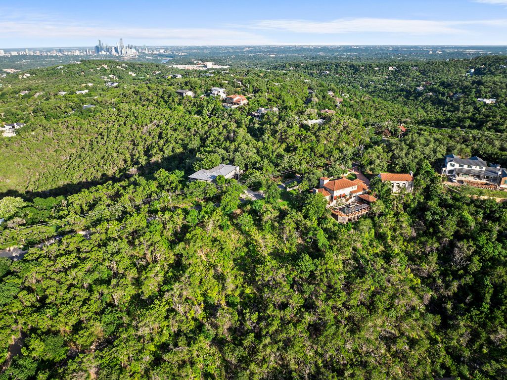 1104 Kennan Road West Lake Hills, TX 78746 - Photo 10 of 20 a view of a lush green field