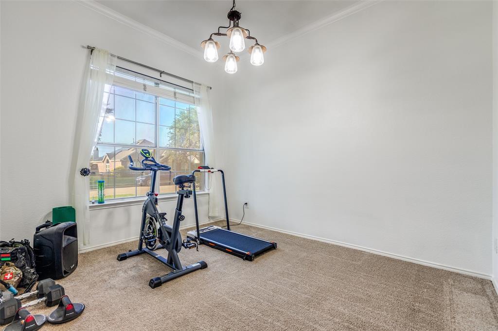 11146 Clearstream Lane Frisco, TX 75035 - Photo 13 of 28 a view of a room with gym equipment