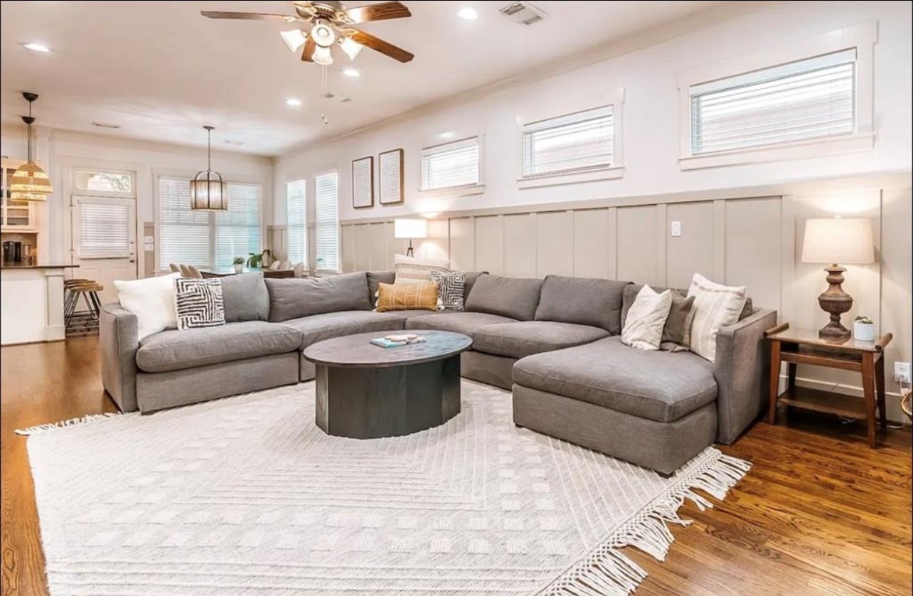 5303 Nett Street, Unit A Houston, TX 77007 - Photo 4 of 23 a living room with furniture and a large window