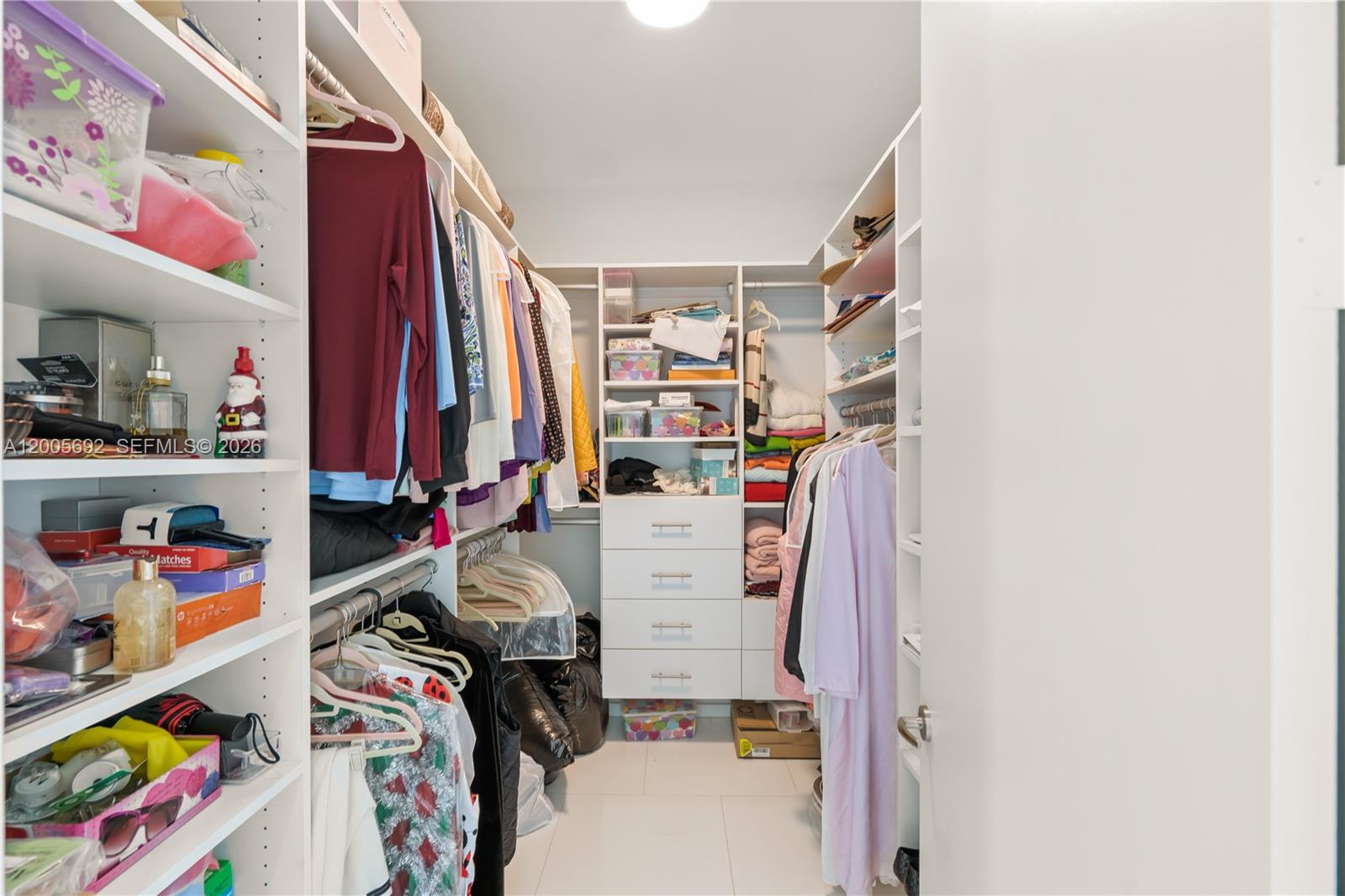 900 Brickell Key Boulevard, Unit 3002 Miami, FL 33131 - Photo 30 of 47 a room with storage and utility