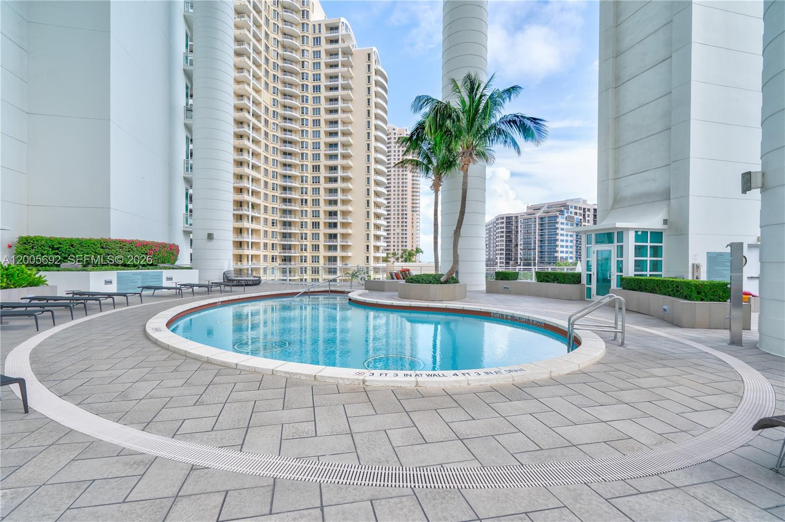 900 Brickell Key Boulevard, Unit 3002 Miami, FL 33131 - Photo 42 of 47 a view of outdoor space yard swimming pool and porch