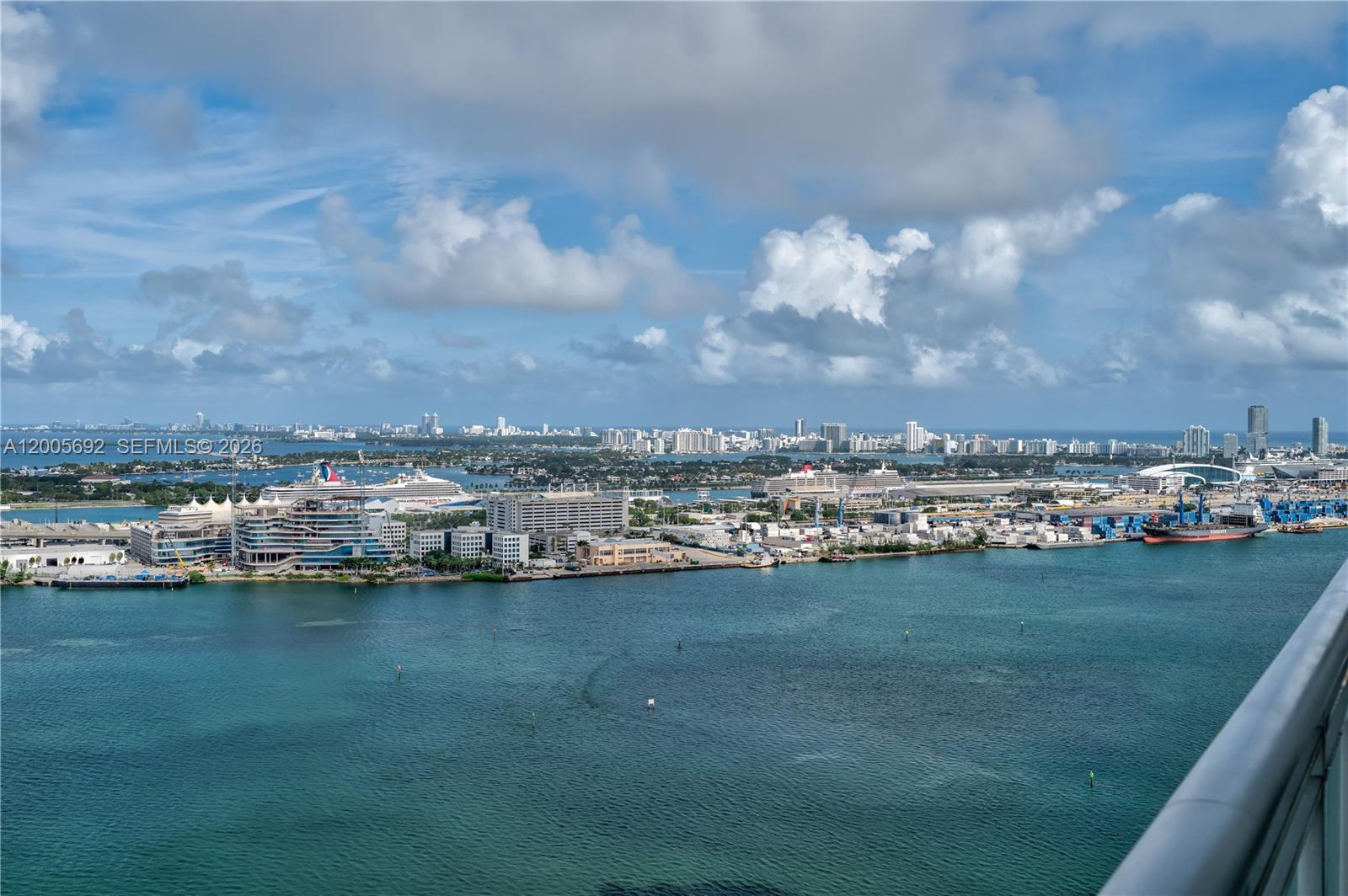 900 Brickell Key Boulevard, Unit 3002 Miami, FL 33131 - Photo 9 of 47 an aerial view of a city