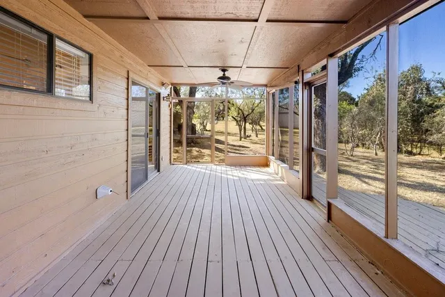 a view of a house with a tree