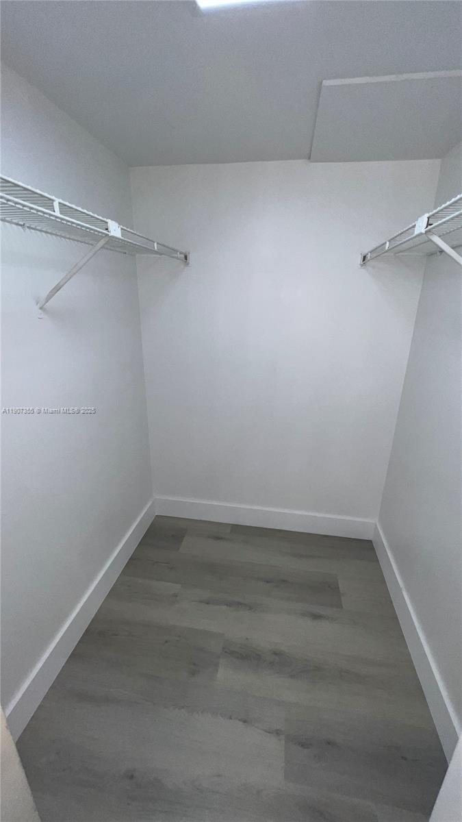 711 North Pine Island Road, Unit 415 Plantation, FL 33324 - Photo 16 of 19 a view of a room with empty racks