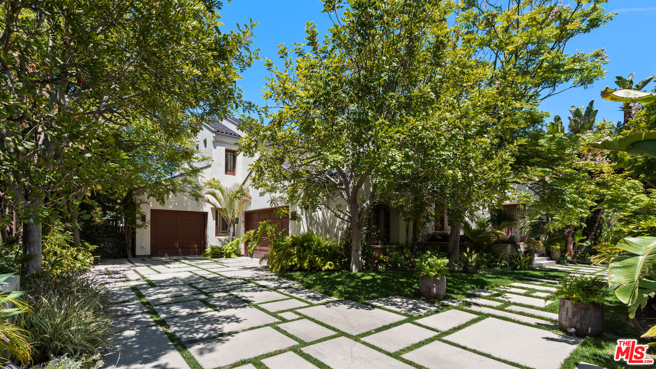 13947 Durham Road Beverly Hills, CA 90210 - Photo 1 of 46 a view of a house with a tree