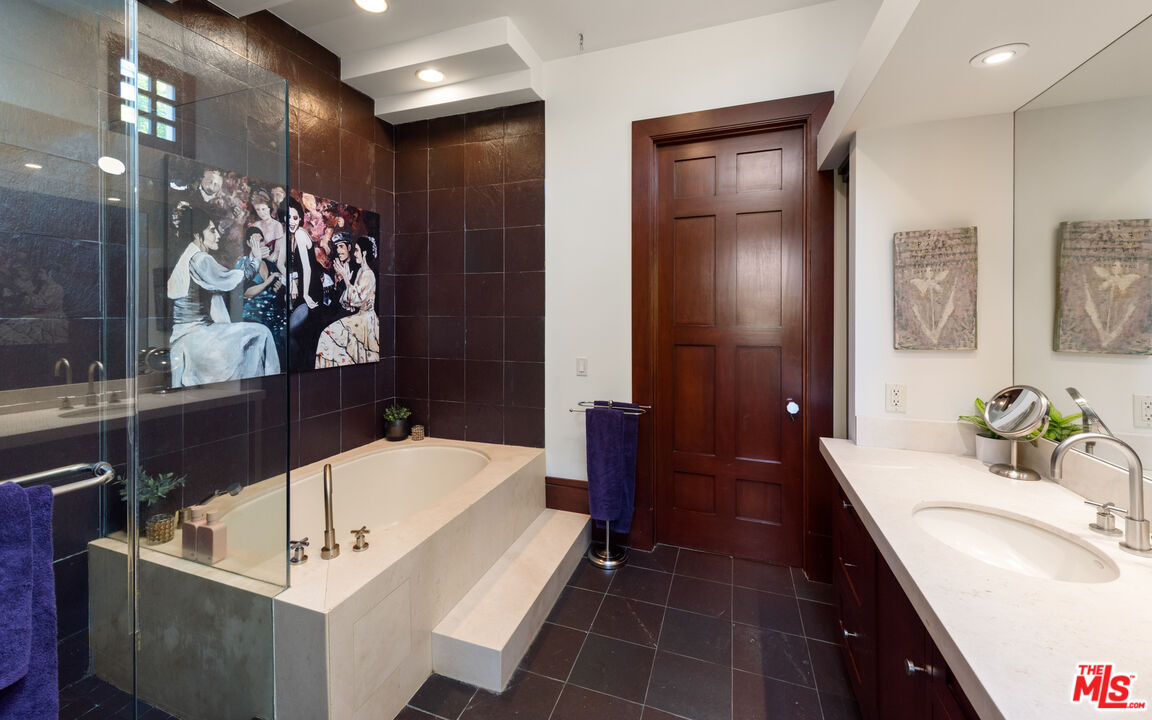 13947 Durham Road Beverly Hills, CA 90210 - Photo 33 of 46 a bathroom with a bathtub shower sink and toilet